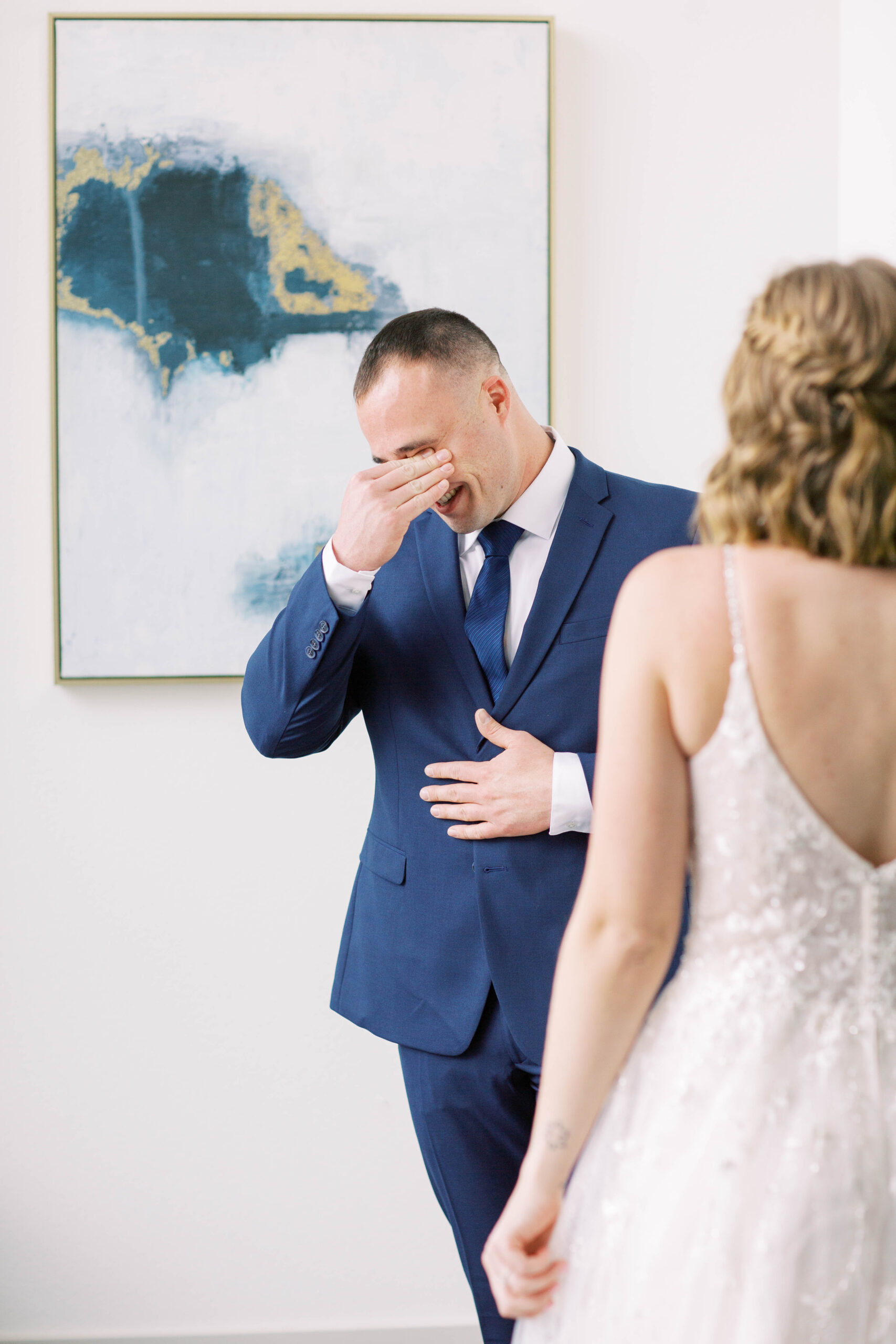 A groom is moved to tears after seeing his bride during their First Look at their wedding in Scottsdale, Arizona.